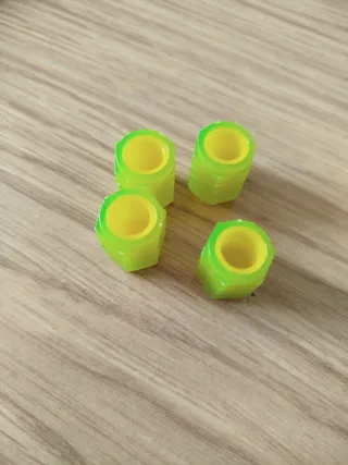 Tapones de llantas fluorescentes