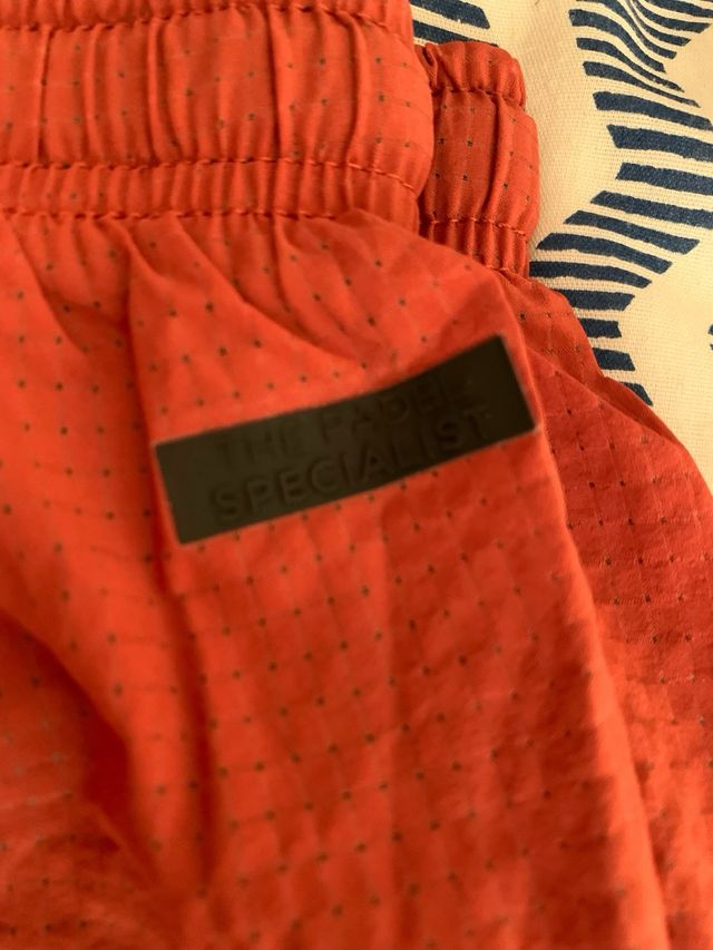 Pantalones cortos Bullpadel naranjas hombre