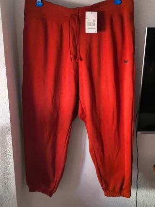 Pantalones chándal Nike mujer naranja