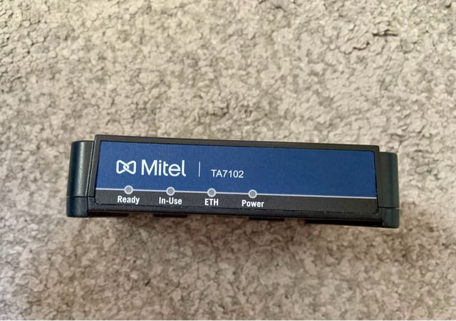 Adaptador Mitel TA7102i