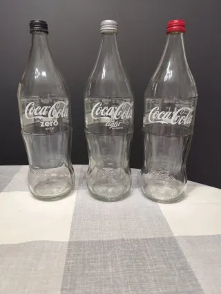 3 bottiglie di vetro Coca-Cola da 1 litro