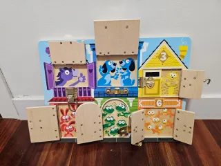 Melissa & Doug Tablero de Pestillos