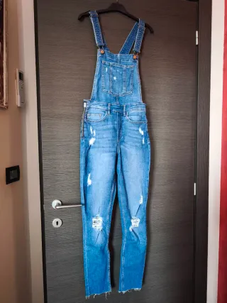 Salopette jeans strappati