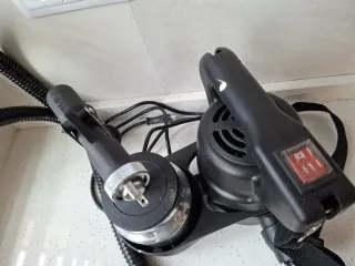 Máquina de pintar con manguera y asa