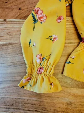 Blusa H&M floral amarilla manga larga