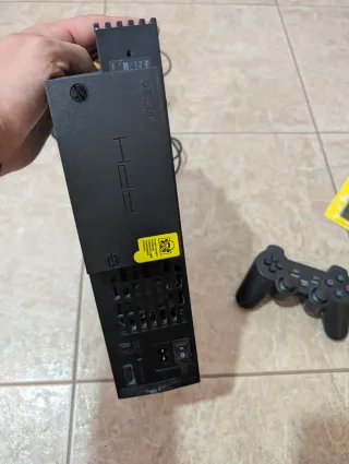 PlayStation 2 con disco duro y accesorios
