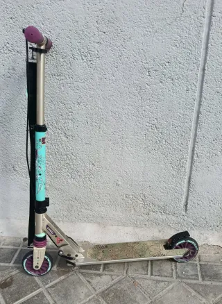 2 Patinetes Oxelo Mid 5 Morado y Verde 
