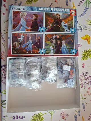 4 Puzzles Frozen de 50, 80, 100 y 150 piezas.