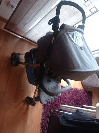 Silla de paseo con plástico de lluvia