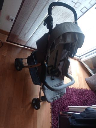 Silla de paseo con plástico de lluvia
