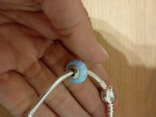 Pulsera Pandora Plata y Rosa
2 charm