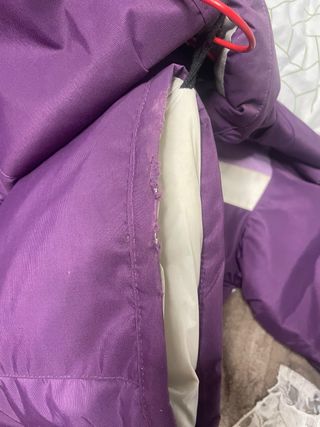 Mono de esquí morado. 12 años