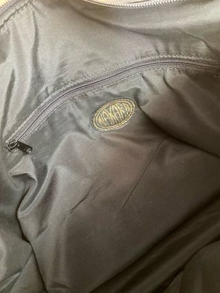 Bolso de cuero negro y cebra 