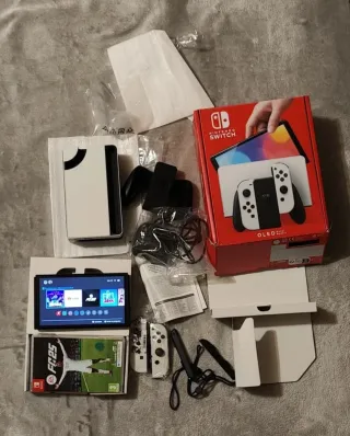 Nintendo switcholed blanca+fifa2025+1 año de garan