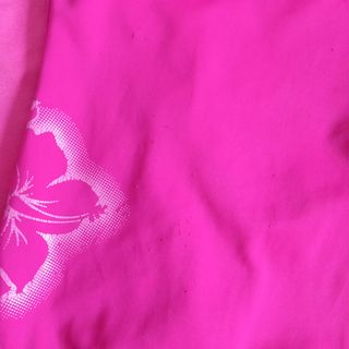 Lote camiseta y bañador niña fucsia