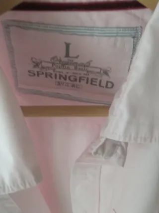 Camisa Oxford Rosa Talla L, tiene una puesta.