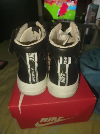 Zapatillas Nike Air Force 1 Mid Blancas y Negras