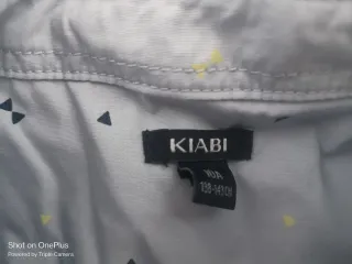 Lote 4 pantaloni e 3 camicie per bambini taglia 9-11 anni