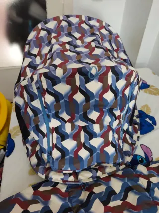 Conjunto capota extensible, ventilada y saco
