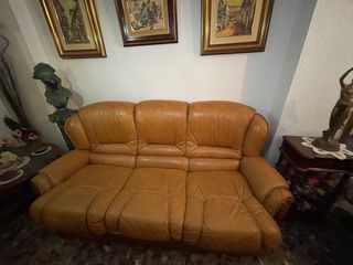 Divano e poltrone in pelle marrone