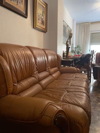 Divano e poltrone in pelle marrone