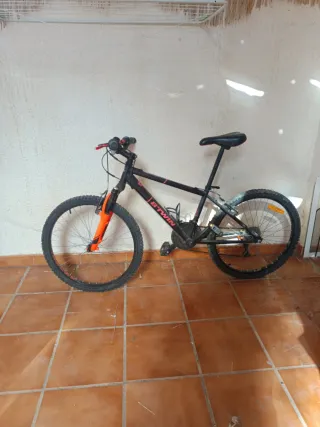 Bicicleta Montaña Negra y Naranja