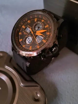 Reloj Hombre Acero Negro y Naranja