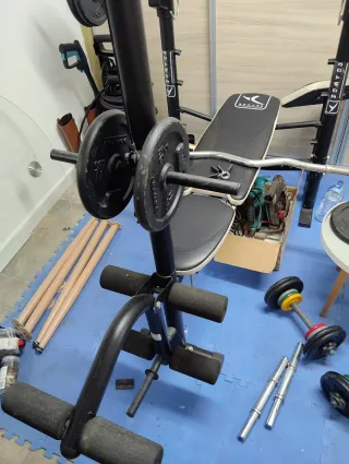 Banco multifunción Domyos + 60kg en  pesas
