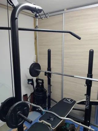 Banco multifunción Domyos + 60kg en  pesas