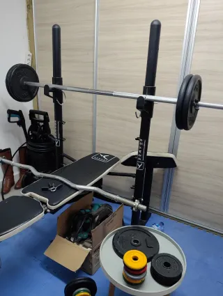 Banco multifunción Domyos + 60kg en  pesas
