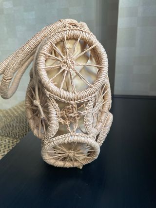 Bolso de rafia redondo