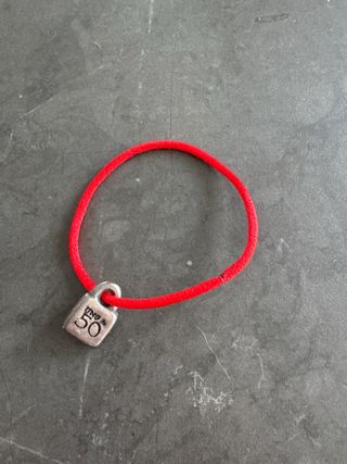 Uno de 50 sol, Charm Candado
