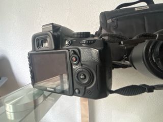 Nikon D3100 + 2 objetivos +bolsos + cargador