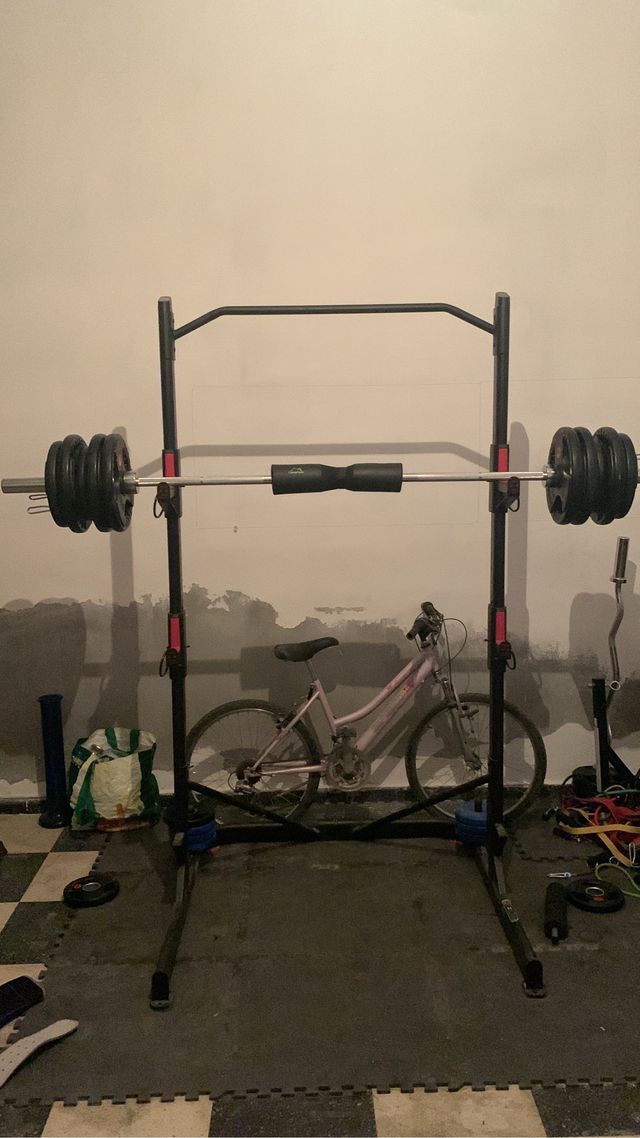 Barra de gimnasio con 135kg