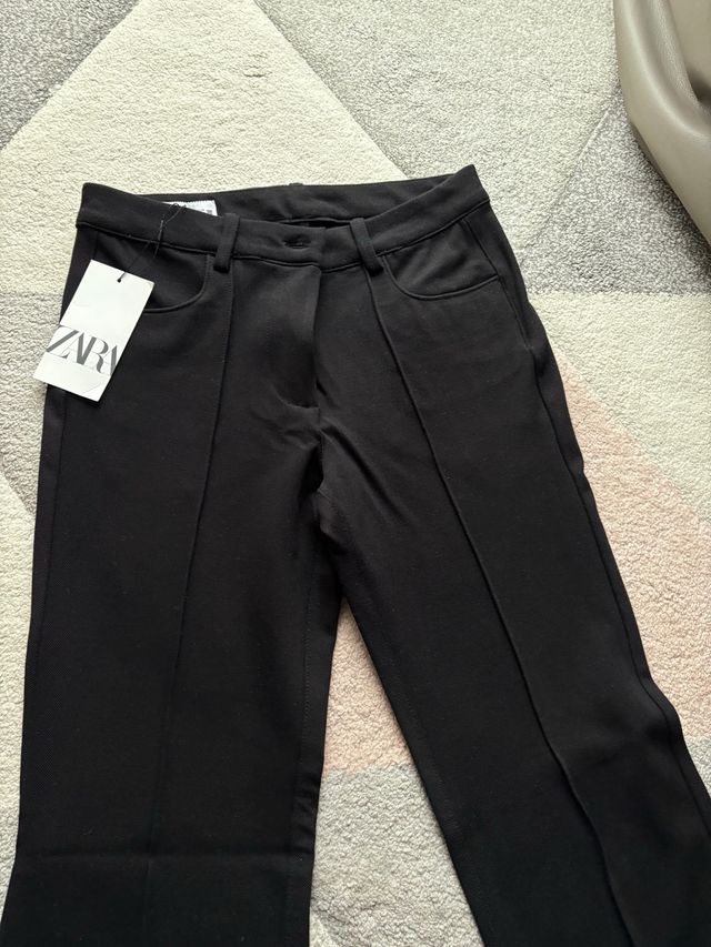 Pantalones campana Zara negros