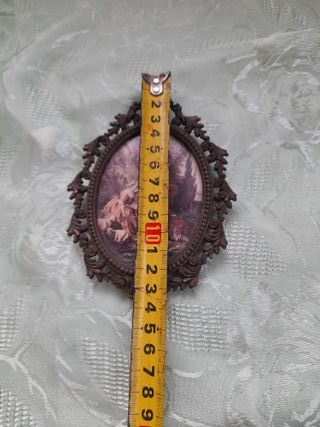 Antica cornice ovale decorata