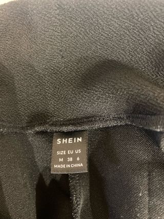 Pantalón negro campana