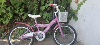 Bicicleta niña rosa con cesta