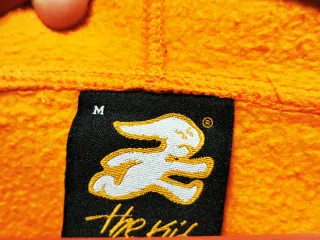 Sudadera El Niño Naranja Cremallera y Capucha