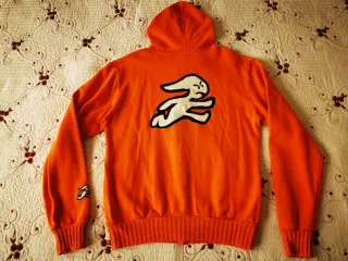 Sudadera El Niño Naranja Cremallera y Capucha