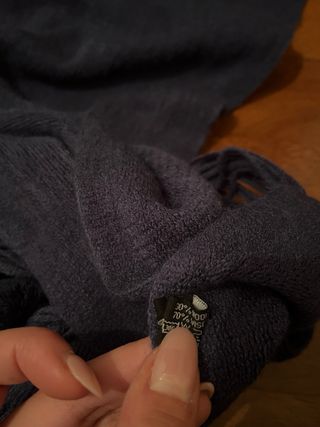 Sciarpa viola con pompon