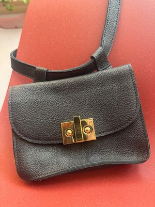 Riñonera System Action Piel Negra y Dorada