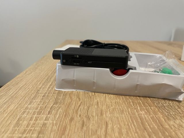 Mini cámara con accesorios