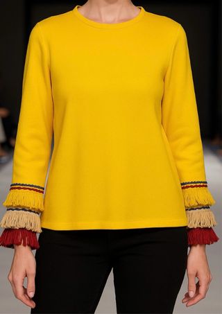 Jersey amarillo con flecos