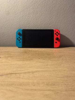 Nintendo Switch + Mando Pro + Juegos