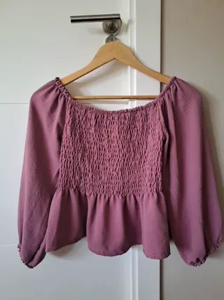Blusa rosa lila con nido de abeja