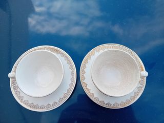 2 tazze antiche con i loro piatti Pickman.