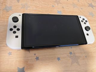 Nintendo Switch OLED Blanca + 2 Juegos + Funda