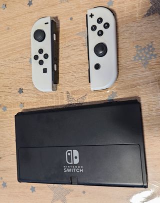 Nintendo Switch OLED Blanca + 2 Juegos + Funda
