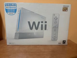 Nintendo Wii con 4 giochi e scatola